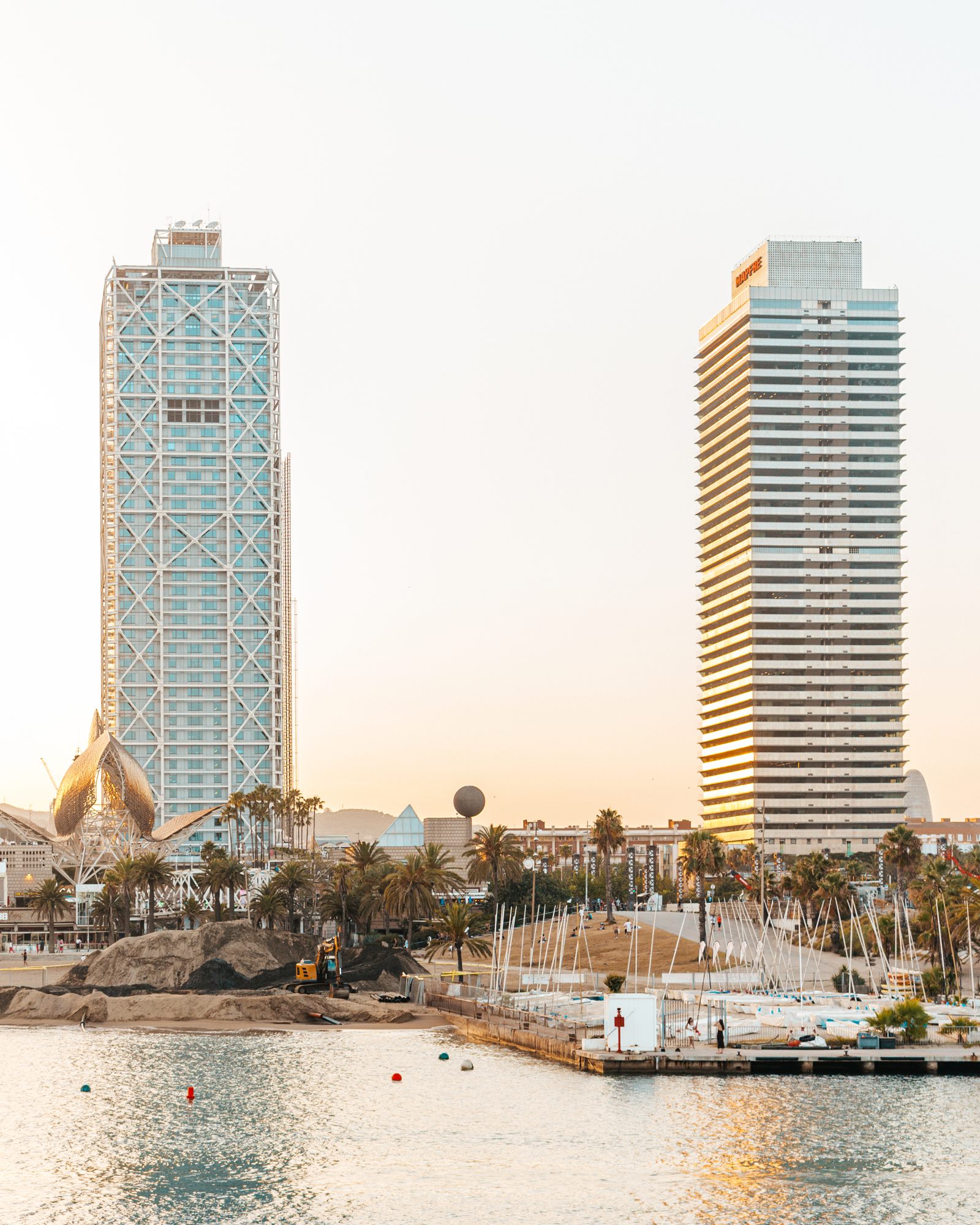 The twin towers of the Olympic Village seen from the sea