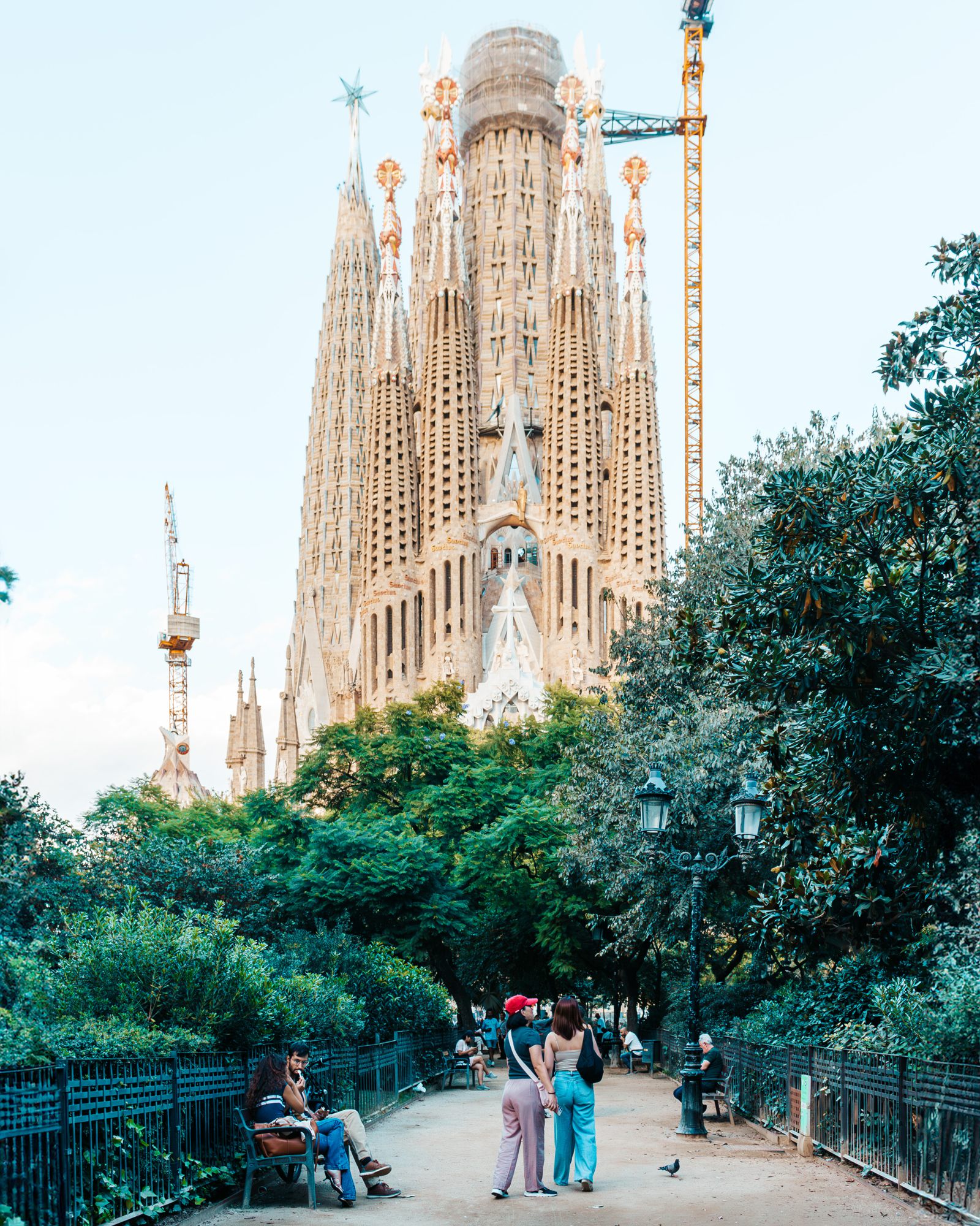The Sagrada Família rising above a park