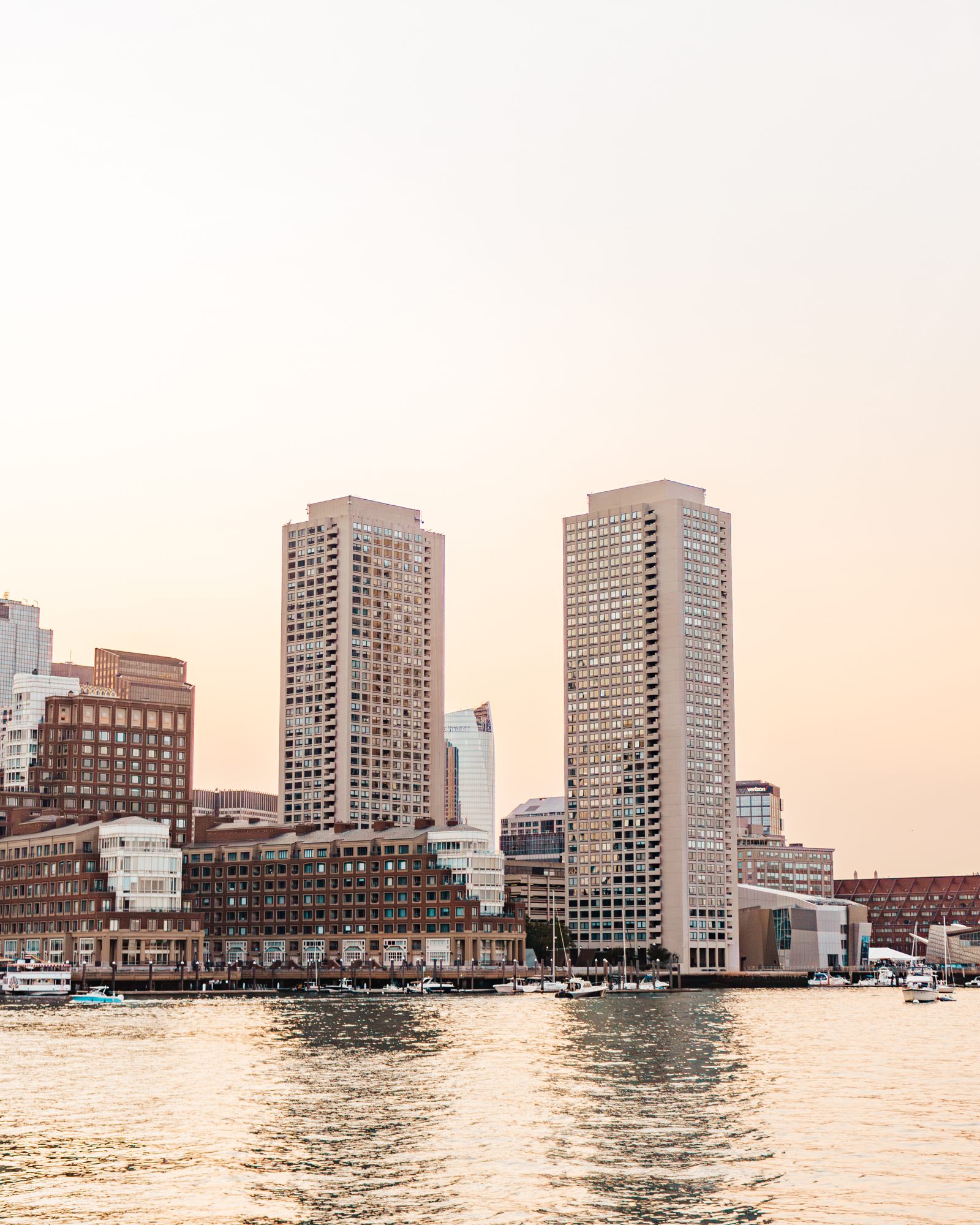 Harbour towers reflected at sunset