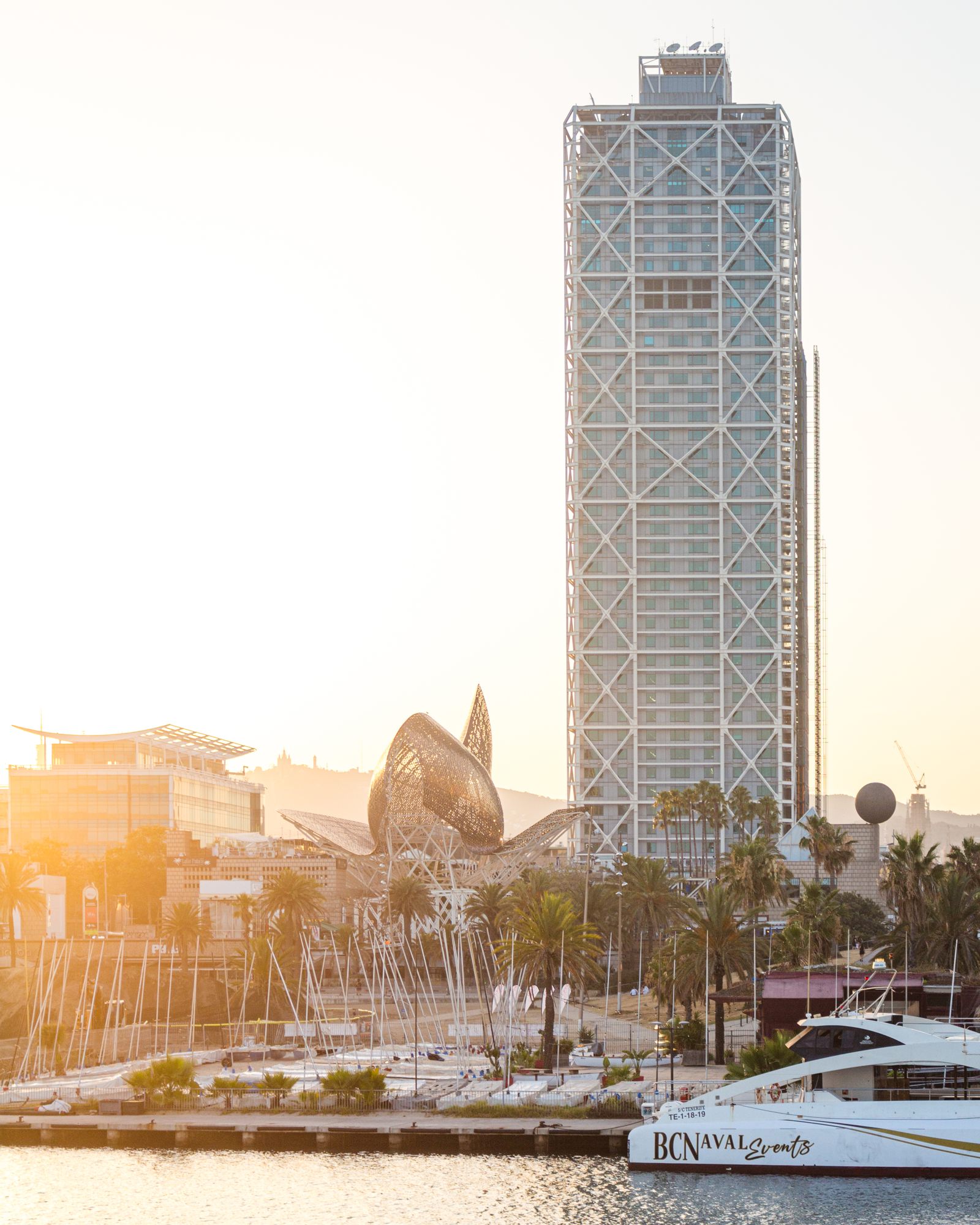 Hotel Arts tower and the Olympic Port at sunset
