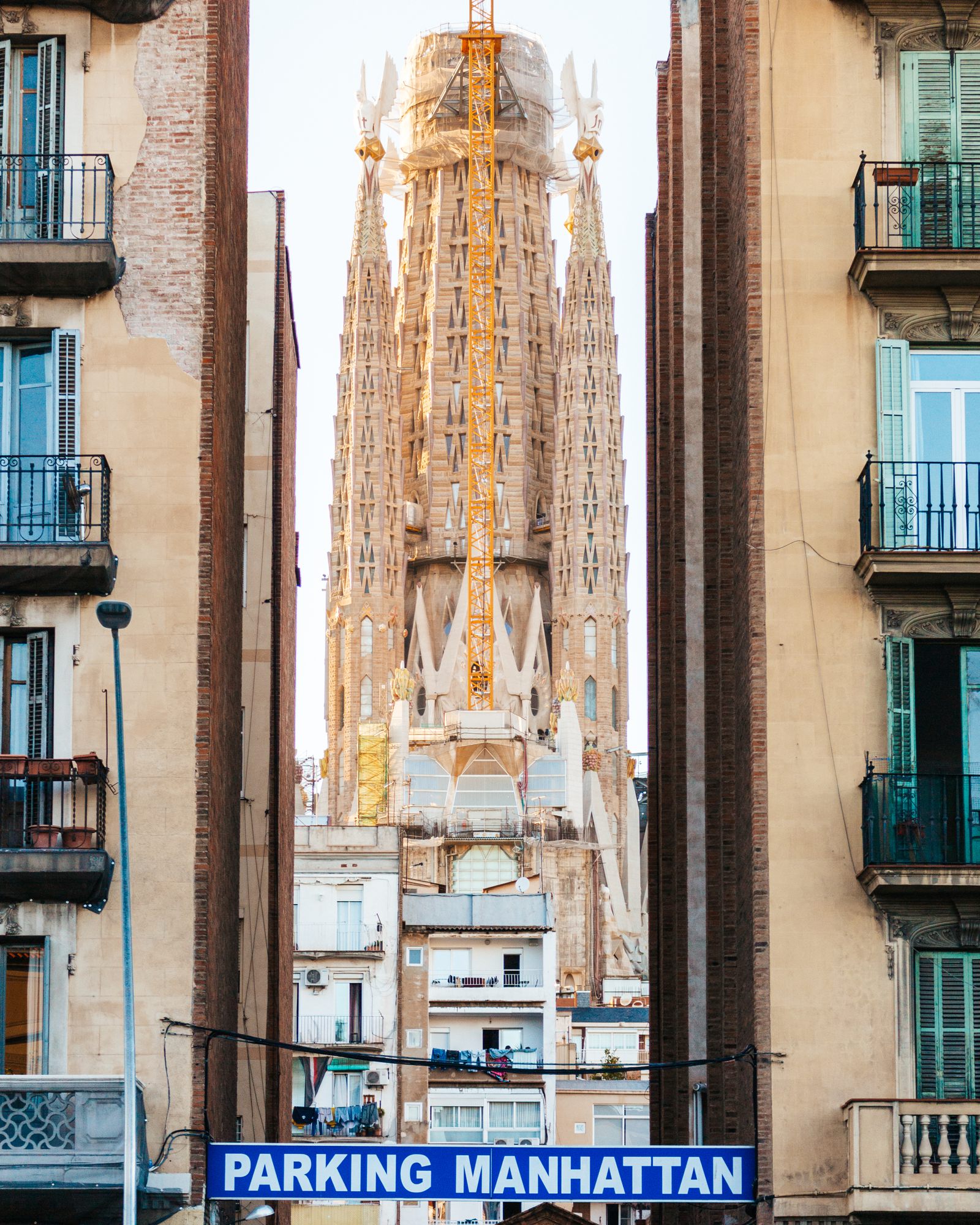 The Sagrada Família framed between two buildings