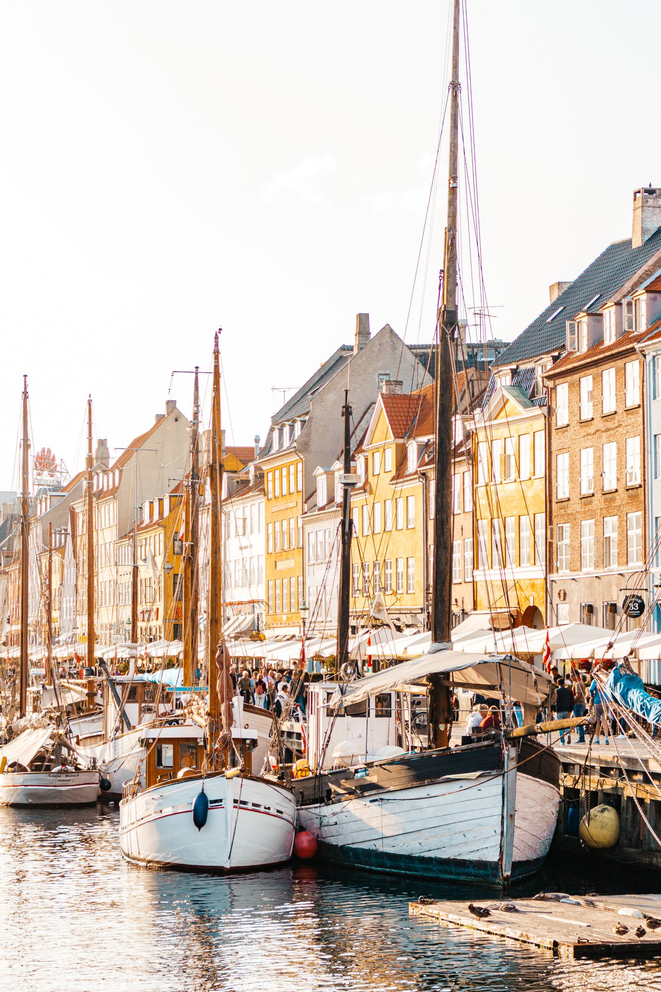 Old sailing ships moored along Nyhavn