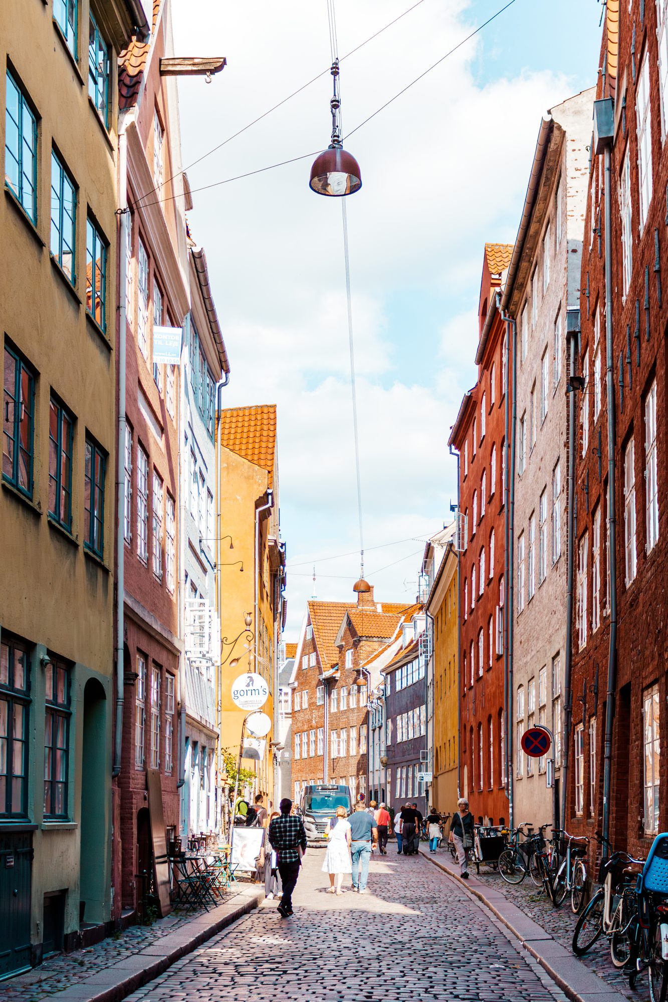 Narrow street with hanging lights